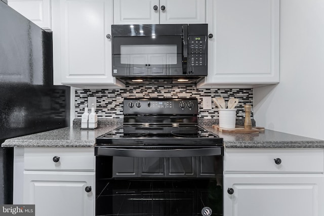 3460 Summit Ct NE Unit 3460, Washington, DC 20018 - kitchen featuring black appliances, decorative backsplash, and white cabinetry