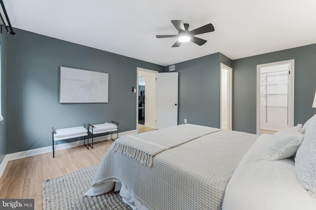 3460 Summit Ct NE Unit 3460, Washington, DC 20018 - bedroom featuring light wood-style flooring and ceiling fan