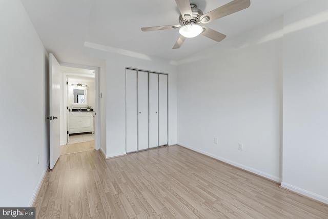 3460 Summit Ct NE Unit 3460, Washington, DC 20018 - unfurnished bedroom featuring light wood-type flooring, a closet, and a ceiling fan