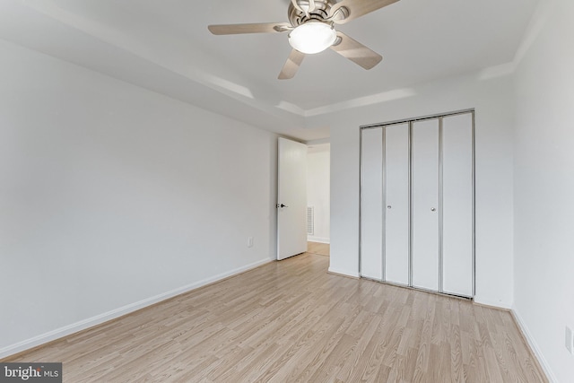 3460 Summit Ct NE Unit 3460, Washington, DC 20018 - unfurnished bedroom featuring wood finished floors, a closet, and a ceiling fan