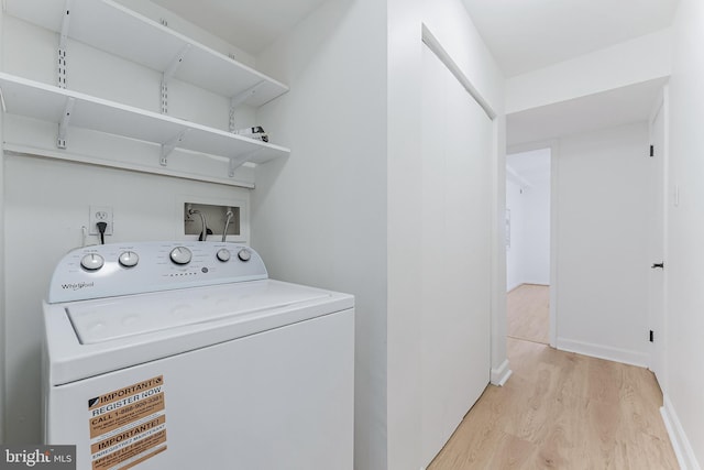 3460 Summit Ct NE Unit 3460, Washington, DC 20018 - laundry area with washer / clothes dryer and light wood-type flooring