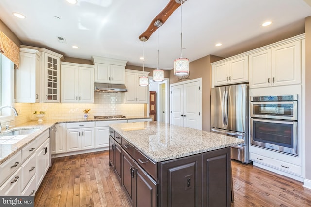 3132 Butternut Ln, Chester Springs, PA 19425 - kitchen featuring stainless steel appliances, white cabinets, dark brown cabinets, wood-type flooring, and glass insert cabinets