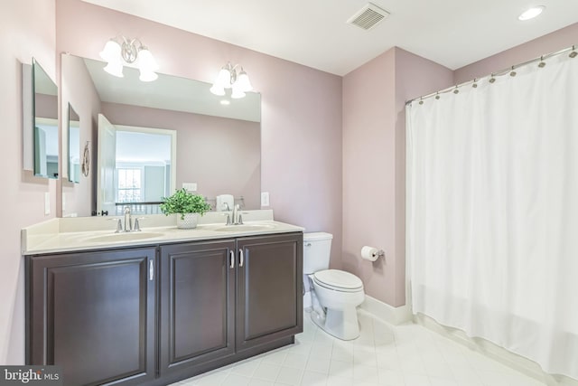 3132 Butternut Ln, Chester Springs, PA 19425 - full bathroom with double vanity, curtained shower, and tile patterned floors