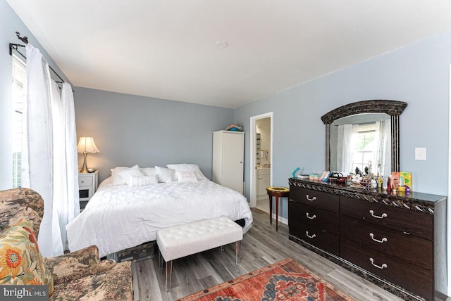 2129 Fort Donelson Ct, Dumfries, VA 22026 - bedroom featuring light wood finished floors and baseboards