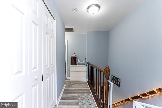 2129 Fort Donelson Ct, Dumfries, VA 22026 - stairway with wood finished floors and baseboards