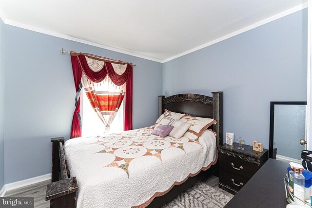 2129 Fort Donelson Ct, Dumfries, VA 22026 - bedroom featuring ornamental molding and wood finished floors