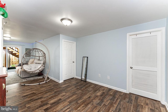 2129 Fort Donelson Ct, Dumfries, VA 22026 - sitting room featuring dark wood-style floors and baseboards
