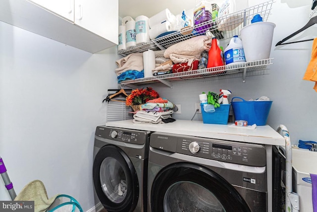 2129 Fort Donelson Ct, Dumfries, VA 22026 - laundry room with cabinet space and independent washer and dryer