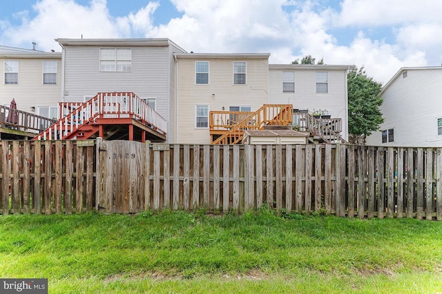 2129 Fort Donelson Ct, Dumfries, VA 22026 - back of property with a fenced backyard and stairway