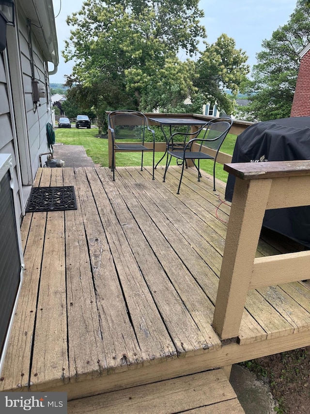 884 Main St, Pennsburg, PA 18073 - wooden terrace featuring a yard
