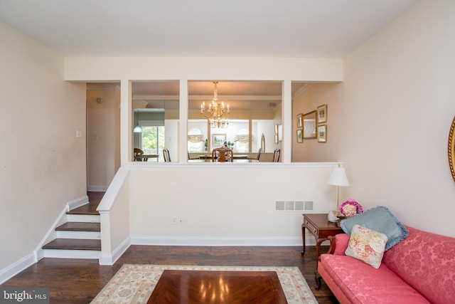 114 Pipers Pl, Chalfont, PA 18914 - living room with wood finished floors, a chandelier, and crown molding