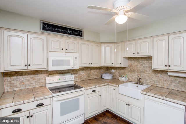 114 Pipers Pl, Chalfont, PA 18914 - kitchen with white appliances, tasteful backsplash, a ceiling fan, cream cabinetry, and dark wood-style flooring