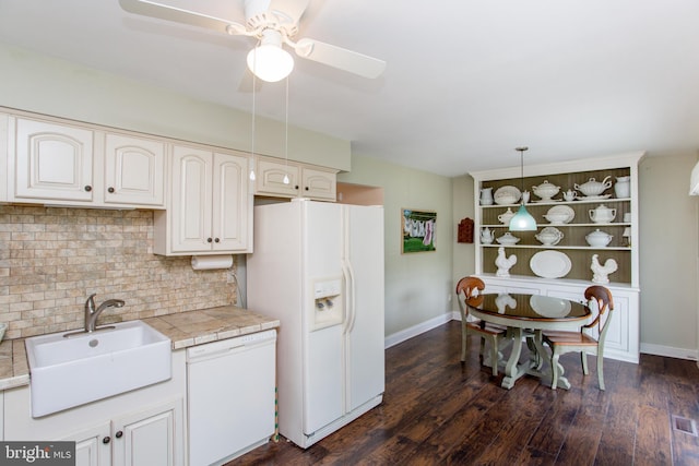 114 Pipers Pl, Chalfont, PA 18914 - kitchen with white appliances, a ceiling fan, decorative backsplash, dark wood finished floors, and decorative light fixtures