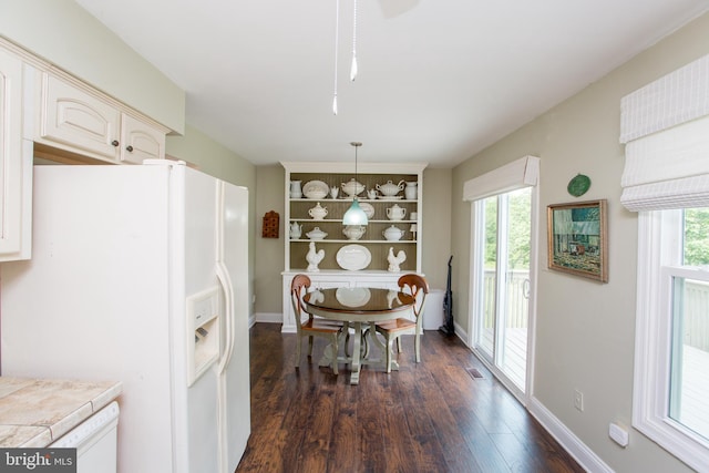 114 Pipers Pl, Chalfont, PA 18914 - dining space with dark wood-style floors and plenty of natural light