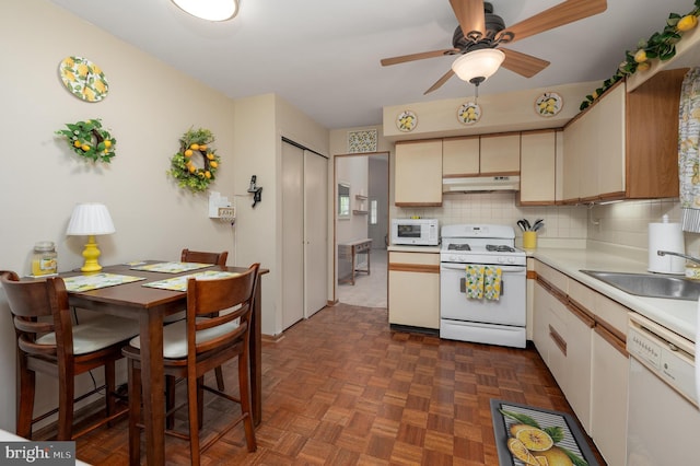 12 Mayville Ln, Marlton, NJ 08053 - kitchen with white appliances, under cabinet range hood, backsplash, ceiling fan, and light countertops