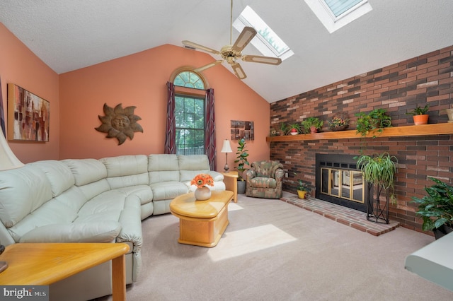 12 Mayville Ln, Marlton, NJ 08053 - living room with a skylight, carpet floors, vaulted ceiling, a fireplace, and ceiling fan