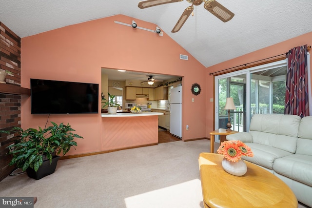 12 Mayville Ln, Marlton, NJ 08053 - living room with ceiling fan, light carpet, high vaulted ceiling, and a textured ceiling