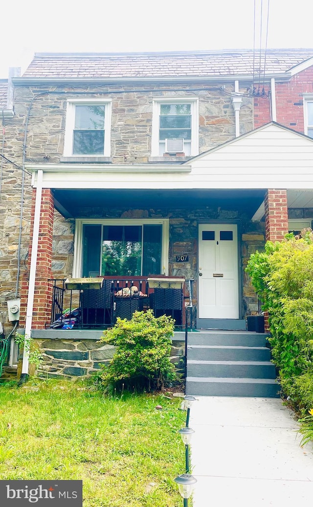 907 Perry Pl NE, Washington, DC 20017 - view of front facade with a porch and a high end roof