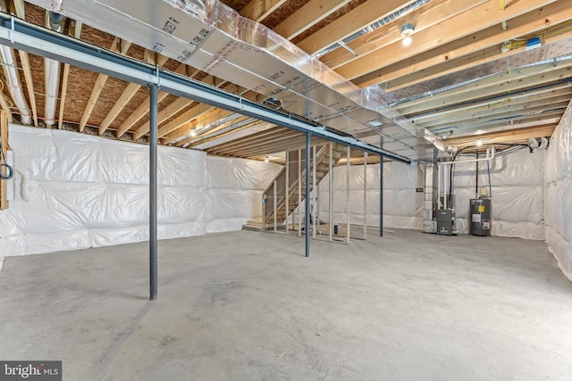 171 Ellicott Rd, Avondale, PA 19311 - unfinished basement with water heater and stairway