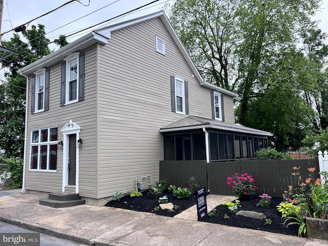 122 W N St, Waynesboro, PA 17268 - view of home's exterior featuring a sunroom