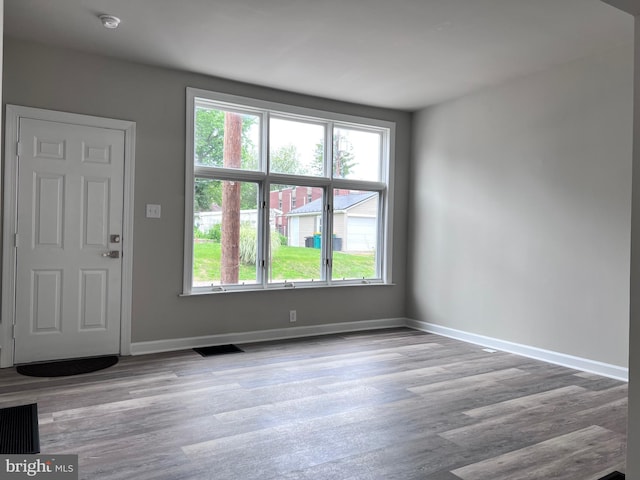 122 W N St, Waynesboro, PA 17268 - foyer with plenty of natural light and wood finished floors