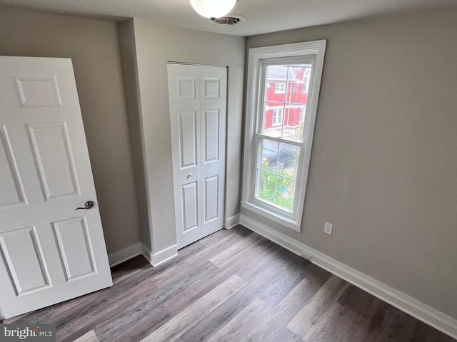 122 W N St, Waynesboro, PA 17268 - unfurnished bedroom with a closet and wood finished floors