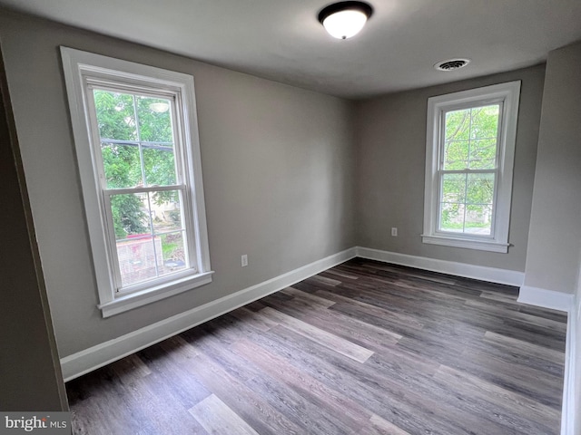122 W N St, Waynesboro, PA 17268 - empty room featuring plenty of natural light and dark wood finished floors