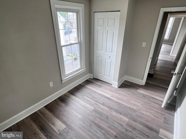 122 W N St, Waynesboro, PA 17268 - unfurnished bedroom with wood finished floors and a closet