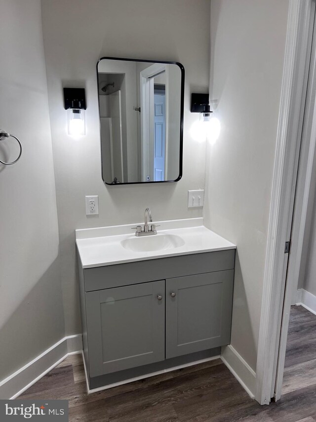 122 W N St, Waynesboro, PA 17268 - bathroom featuring vanity and wood finished floors