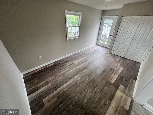 122 W N St, Waynesboro, PA 17268 - unfurnished bedroom featuring dark wood-style floors and a closet