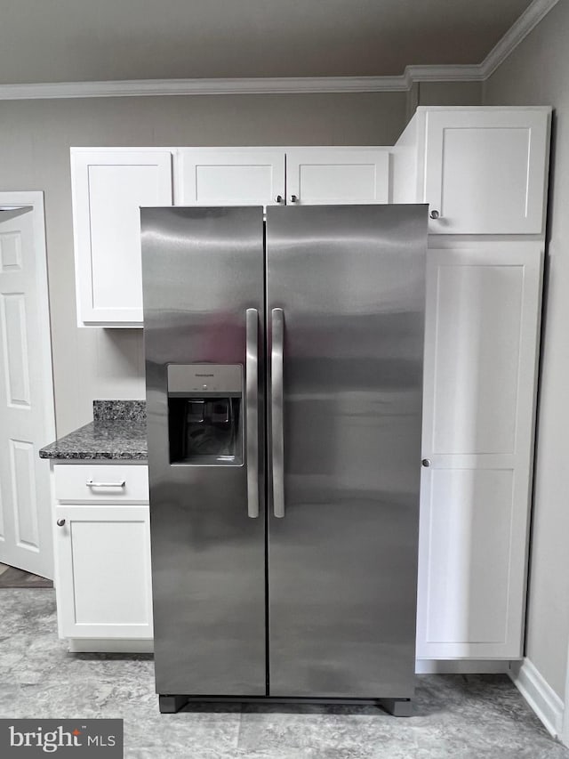 122 W N St, Waynesboro, PA 17268 - kitchen featuring stainless steel fridge with ice dispenser, ornamental molding, white cabinets, dark stone counters, and light wood-style floors