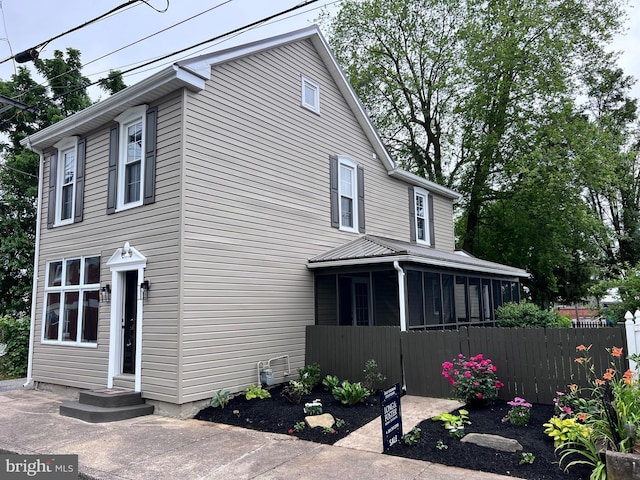 122 W N St, Waynesboro, PA 17268 - view of side of home with a sunroom