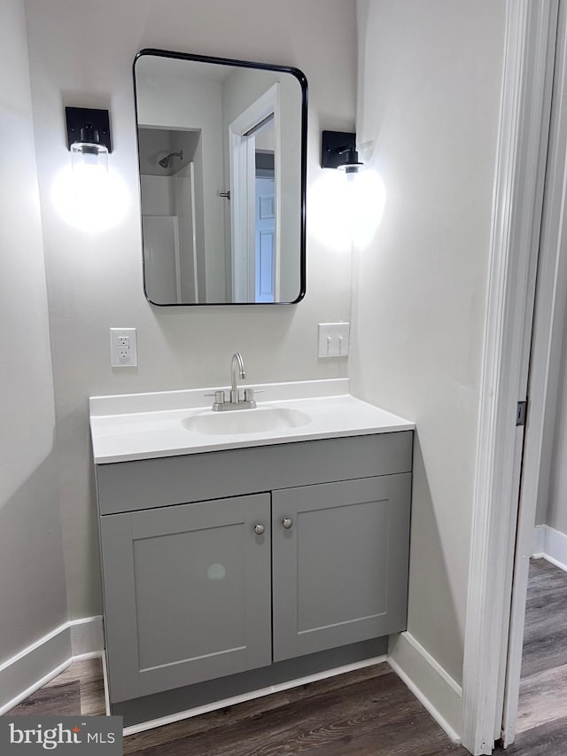 122 W N St, Waynesboro, PA 17268 - bathroom featuring vanity and wood finished floors