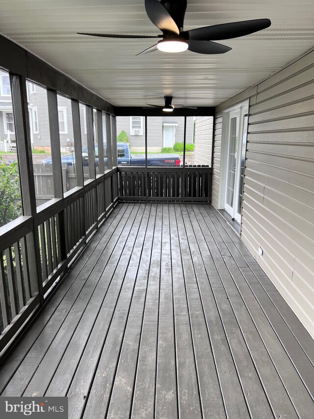 122 W N St, Waynesboro, PA 17268 - unfurnished sunroom featuring a ceiling fan