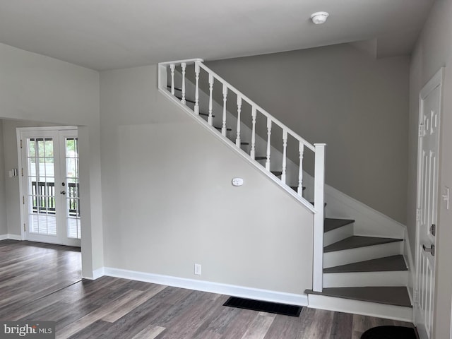 122 W N St, Waynesboro, PA 17268 - stairs with wood finished floors and french doors