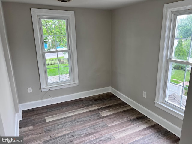 122 W N St, Waynesboro, PA 17268 - empty room featuring dark wood-type flooring and baseboards