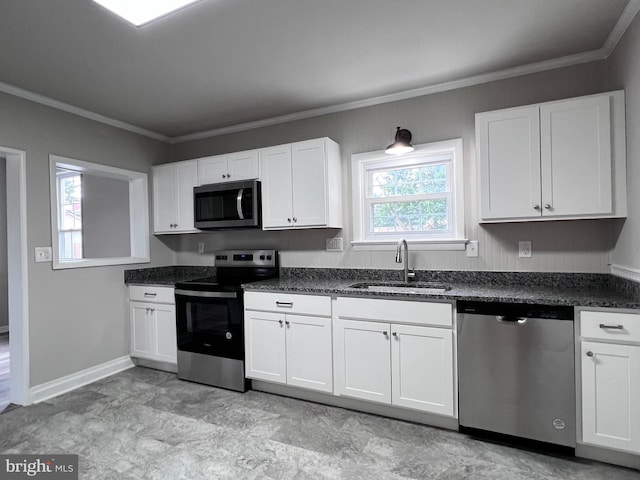 122 W N St, Waynesboro, PA 17268 - kitchen featuring stainless steel appliances, crown molding, and white cabinets