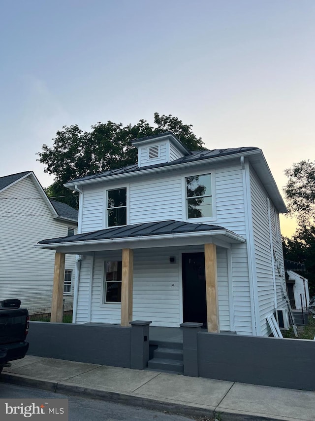 553 Highland Ave, Winchester, VA 22601 - american foursquare style home with a porch, a standing seam roof, and a metal roof