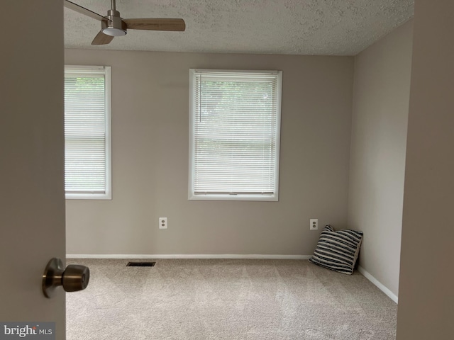 9220 Redbridge Ct, Laurel, MD 20723 - carpeted empty room featuring a ceiling fan and a textured ceiling