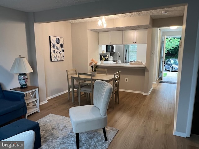 9220 Redbridge Ct, Laurel, MD 20723 - dining space with wood finished floors and baseboards