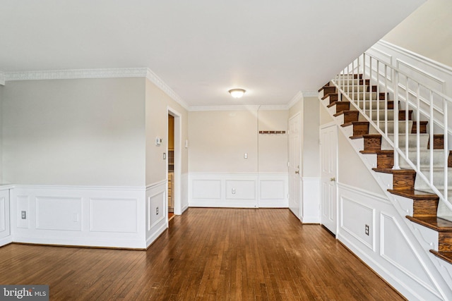 1803 T St NW Unit 11, Washington, DC 20009 - empty room featuring hardwood / wood-style floors, stairway, a decorative wall, crown molding, and wainscoting