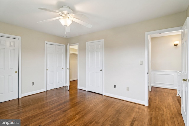1803 T St NW Unit 11, Washington, DC 20009 - unfurnished bedroom featuring wood finished floors, multiple closets, and a ceiling fan