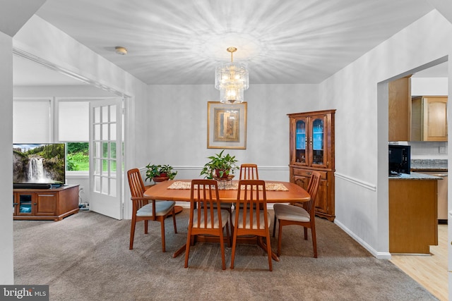 5139 Celestial Way, Columbia, MD 21044 - dining space with a chandelier and light carpet