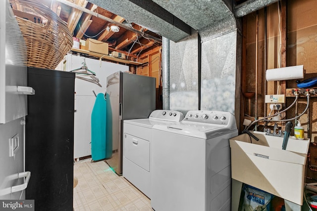 5139 Celestial Way, Columbia, MD 21044 - laundry room with washer and dryer and light flooring