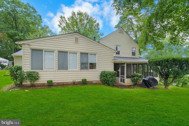 5139 Celestial Way, Columbia, MD 21044 - rear view of property featuring a sunroom and a lawn