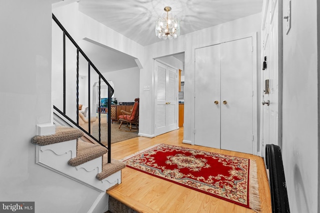 5139 Celestial Way, Columbia, MD 21044 - foyer with stairs, wood finished floors, a chandelier, and arched walkways