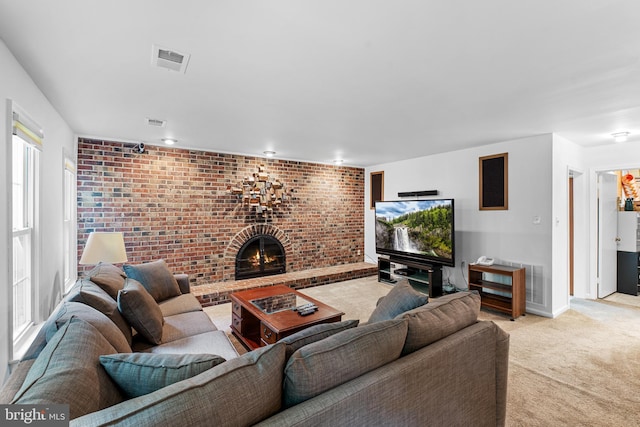 5139 Celestial Way, Columbia, MD 21044 - living area with brick wall, light colored carpet, and a fireplace
