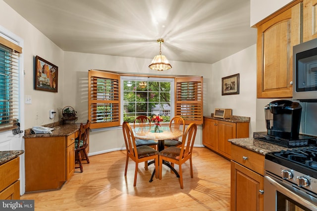5139 Celestial Way, Columbia, MD 21044 - dining room with light wood-type flooring and a chandelier