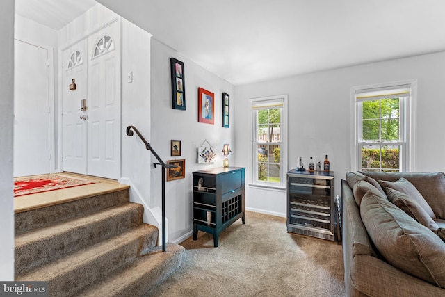 5139 Celestial Way, Columbia, MD 21044 - carpeted living area with beverage cooler and stairway