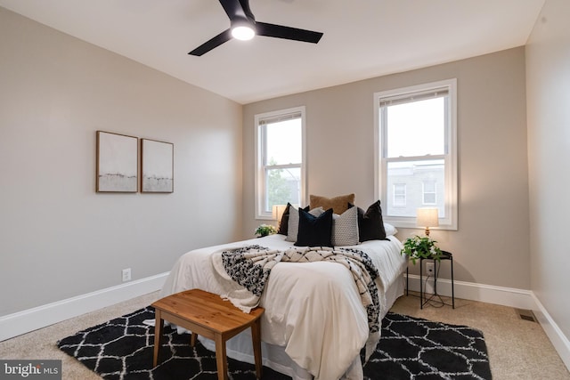 3910 E Pratt St, Baltimore, MD 21224 - bedroom with ceiling fan and carpet floors